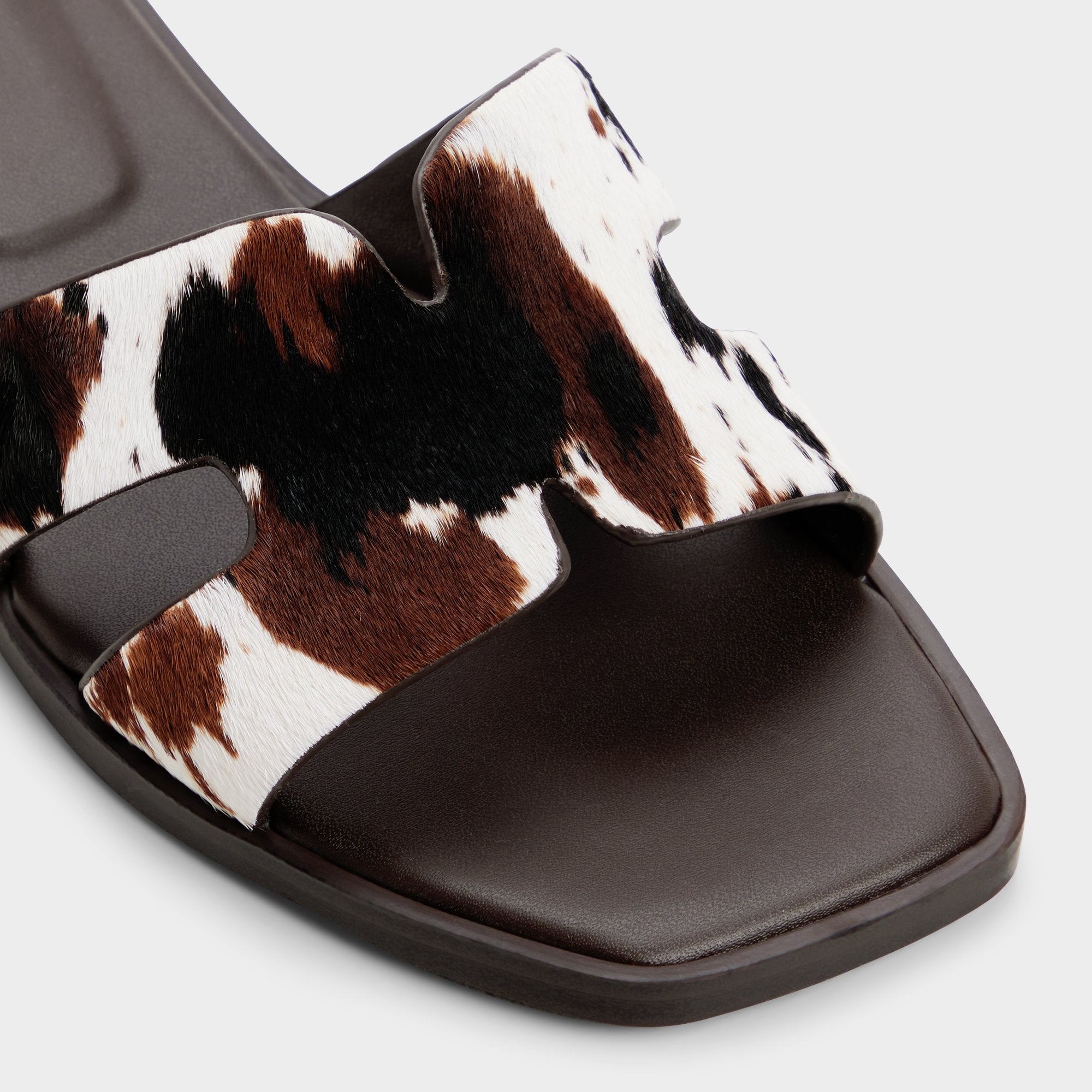 ALDO Itsandal sandales plates imprimé vache