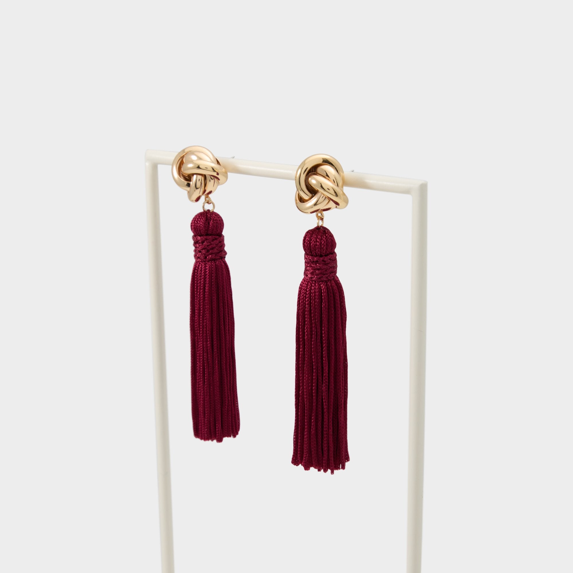 Aldo Tassira accessoire bordeaux