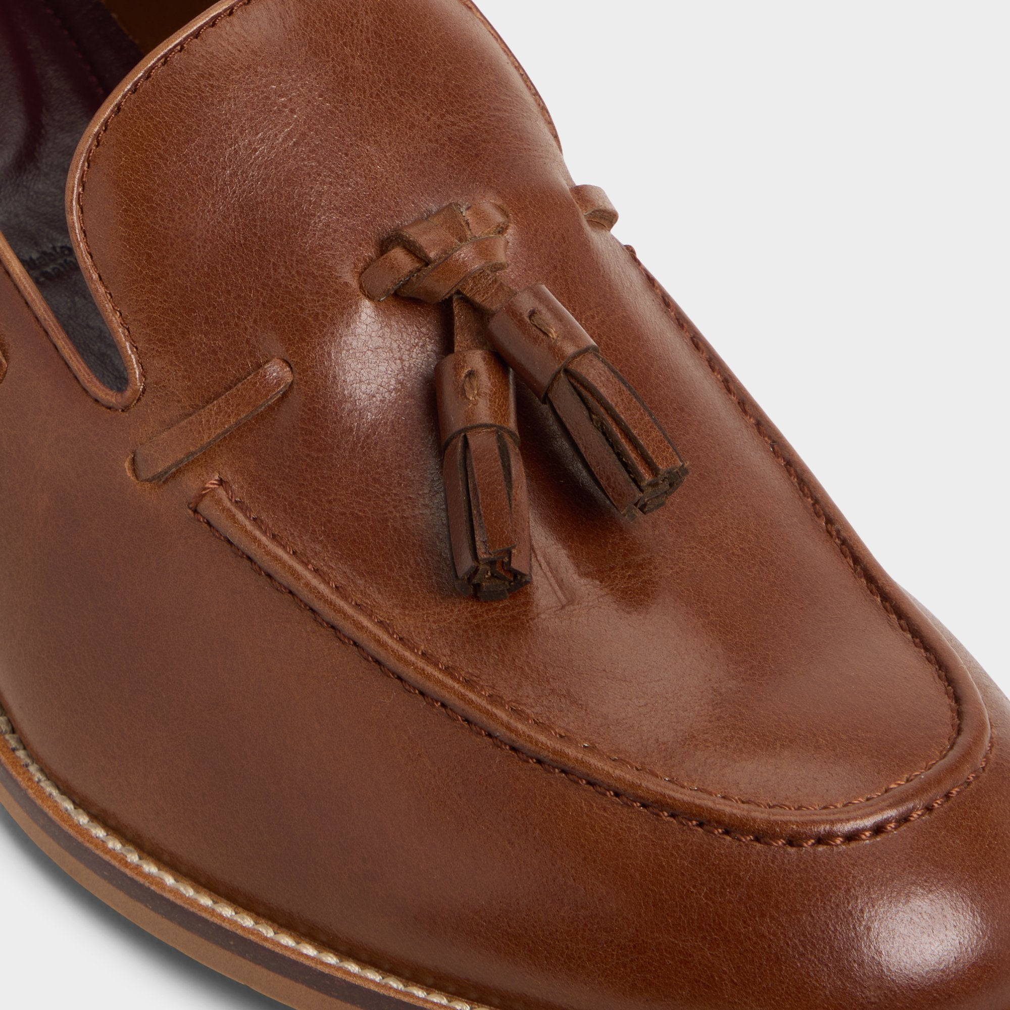 ALDO Nunez mocassins cognac à pompons