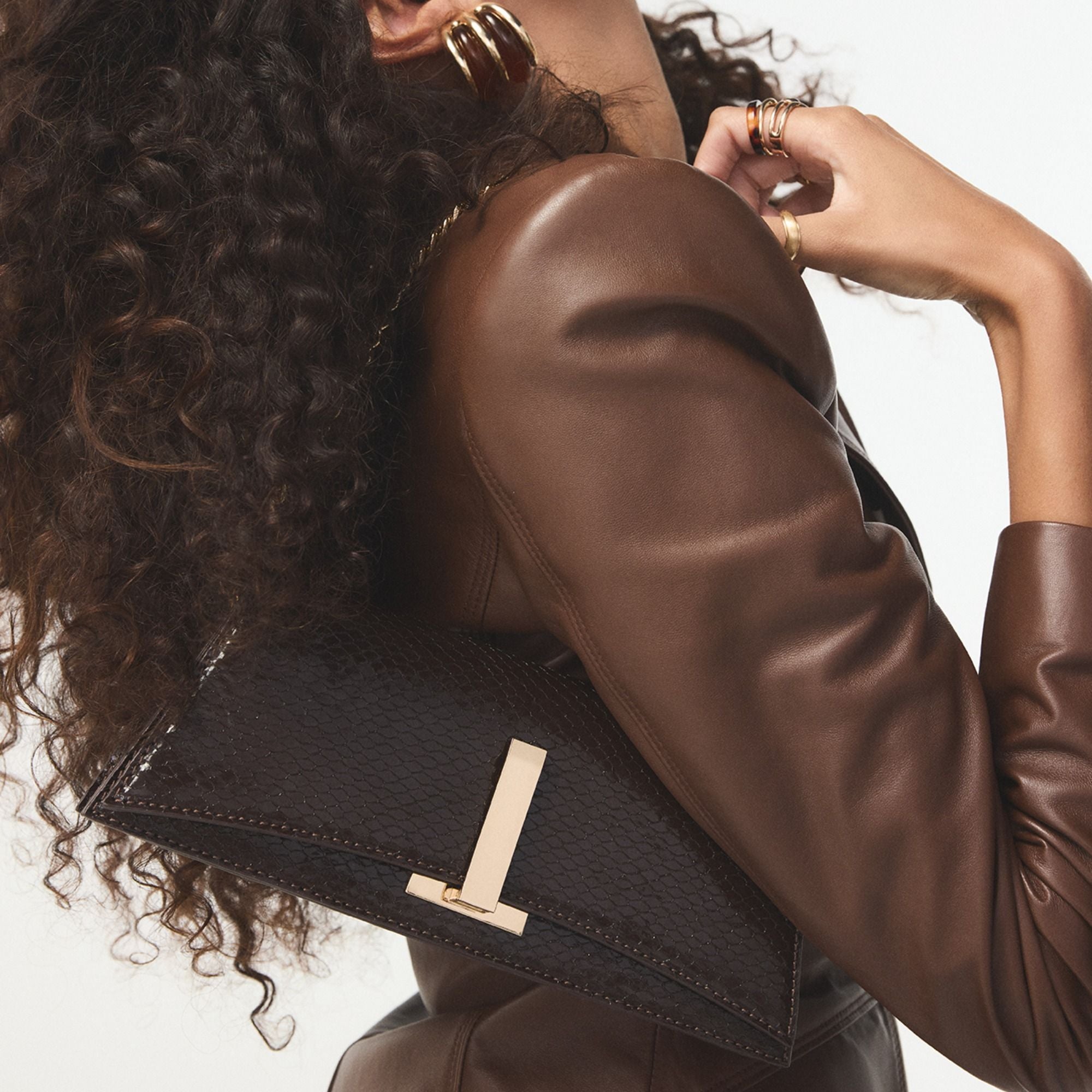 Aldo Mmychaelaa pochette marron imprimé animal