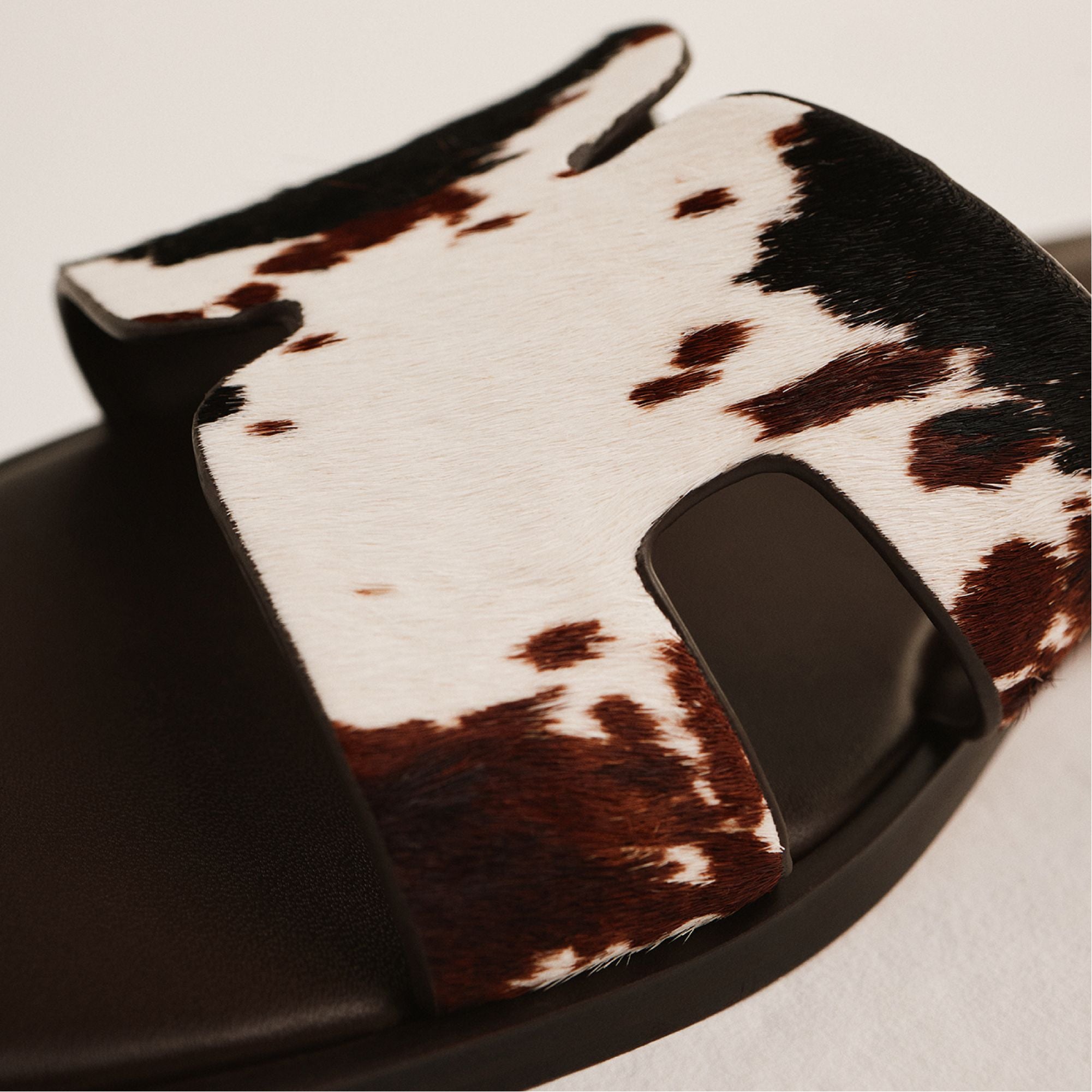 ALDO Itsandal sandales plates imprimé vache
