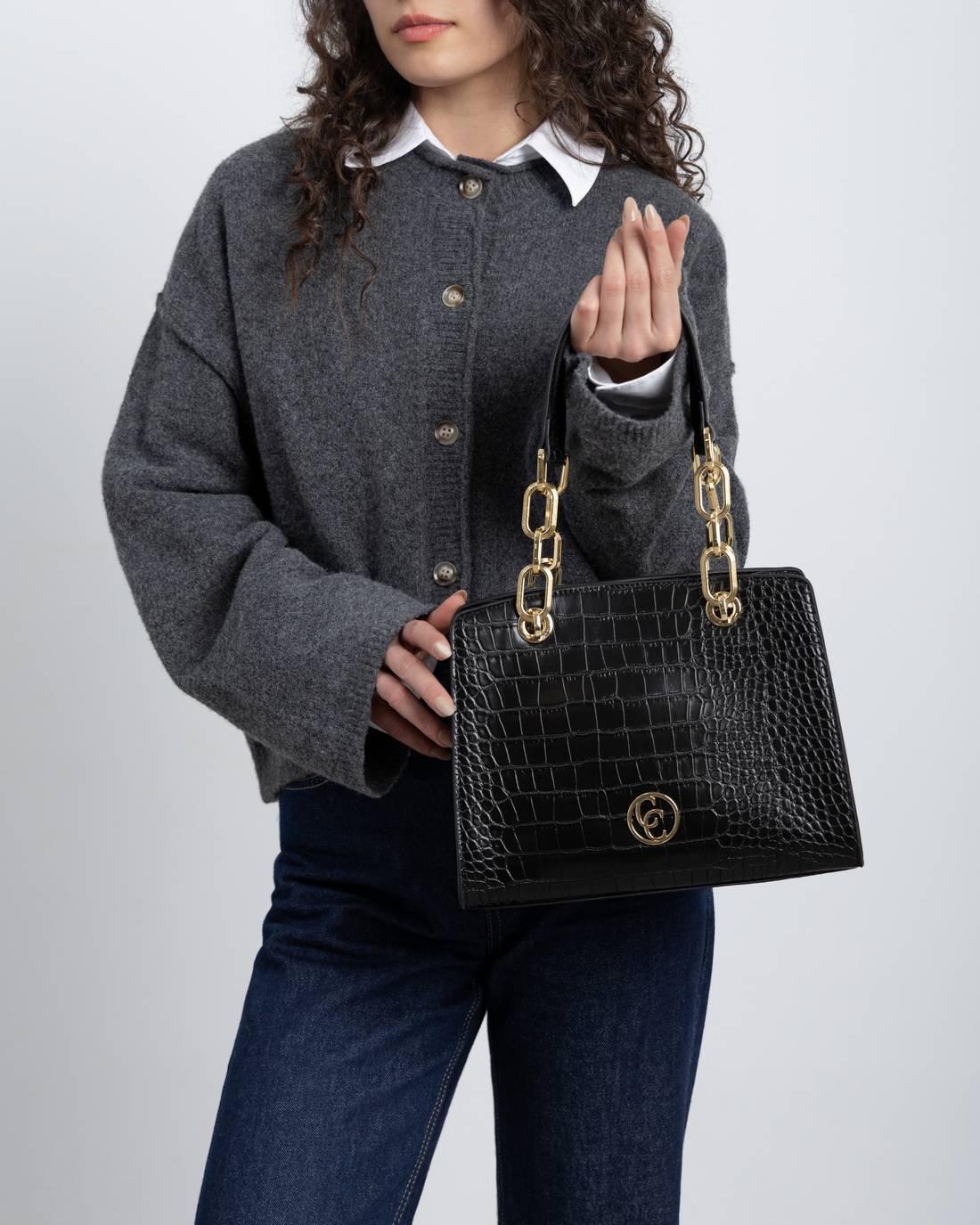 Carmela 18618101 sac bandoulière noir effet coco vegan